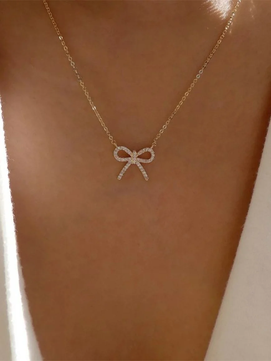Tied in Gold Bow Neckpiece Only ₹145 – Minimal Jewelry on Everstylish
